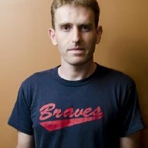 Трэвис Миллс